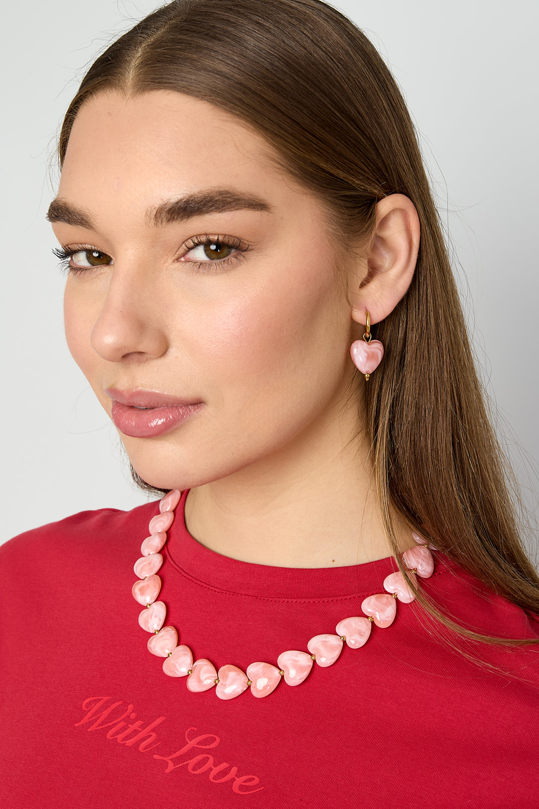 Oorbellen met hartvormige kralen