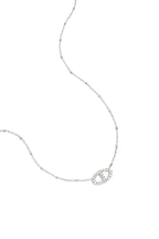 Ketting met versierde ovale hanger - zilver