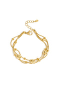 Armband met kettingen en stippen - goud