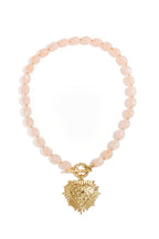 Kralenketting met frontsluitingcharm - licht roze