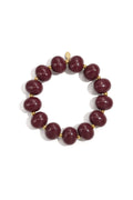 Elastieke kralenarmband met grote kralen - wijn rood